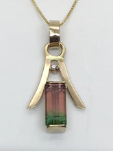 Load image into Gallery viewer, brilliant pink and green tourmaline under a gold pagoda roof , end-only bezel settings
