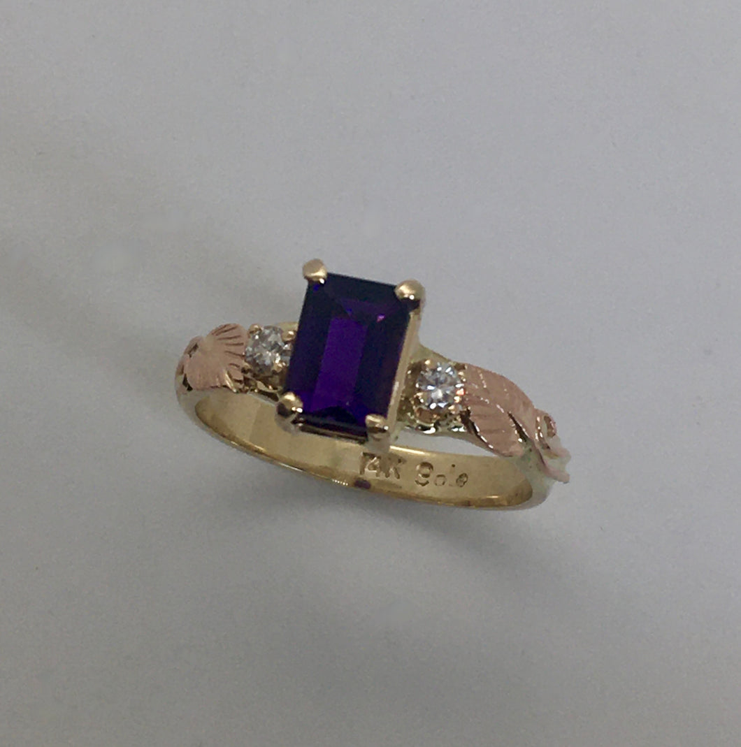 deep purple emerald cut amethyst, 2 diamonds and hand fabricated 14K rose gold leaves and tendrils ring