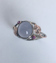 Load image into Gallery viewer, sensuous cabachonl blue chalcedony bezel set with pink sapphires in rose and white 14K gold ring with leaf pattern