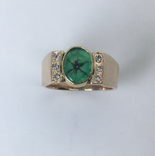 Load image into Gallery viewer, oval cabochon emerald ring has black spokes from the center, 6 diamonds on the sides
