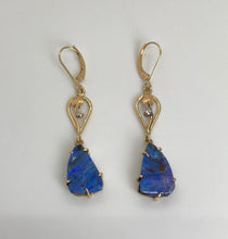Load image into Gallery viewer, Blue/purple triangular Boulder Opals in handmade prong settings dangling from leaf and vine motif openwork, each set with 1 small diamond, on European earn wires