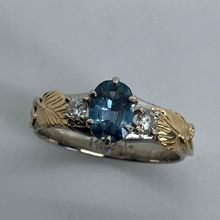 Load image into Gallery viewer, 14K white gold and 18K yellow gold band with leaves, diamonds and a gorgeous ocean colored Montana Sapphire