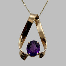 Load image into Gallery viewer, faceted oval amethyst in a ribbon of 14K gold pendant