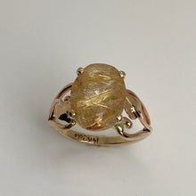 Load image into Gallery viewer, gold open heart with leaves band with gold crystals of rutile in quartz