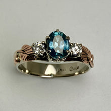 Load image into Gallery viewer, Ring with blue gemstone and diamonds , leaves and mixed golds
