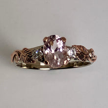 Load image into Gallery viewer, Rose gold ring with a pink gemstone on a gray background