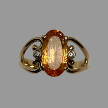 Load image into Gallery viewer, Large oval amber colored Topaz and 2 smaller diamonds in an open worked 14K gold band