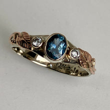 Load image into Gallery viewer, 14K white gold ring with oval teal blue Montana Sapphire and diamonds with 14K rose gold leaves and vines