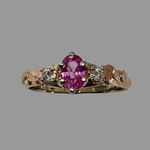 Load image into Gallery viewer, white and rose gold ring with an oval pink sapphire and 2 diamonds, with leaves and vines