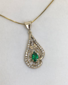 Fancy Emerald Pendant with Lots of Diamonds