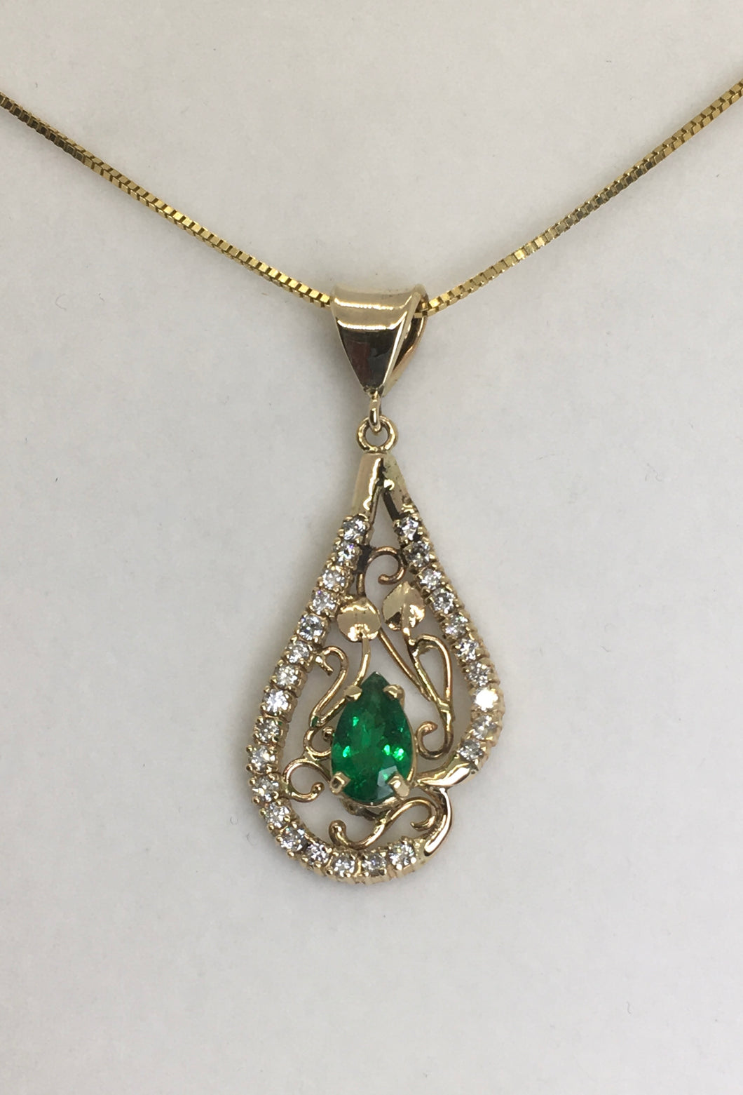 Fancy Emerald Pendant with Lots of Diamonds