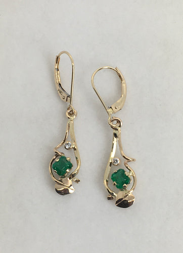 stunning emerald cut emerald earrings