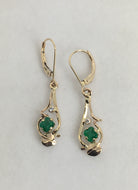 stunning emerald cut emerald earrings