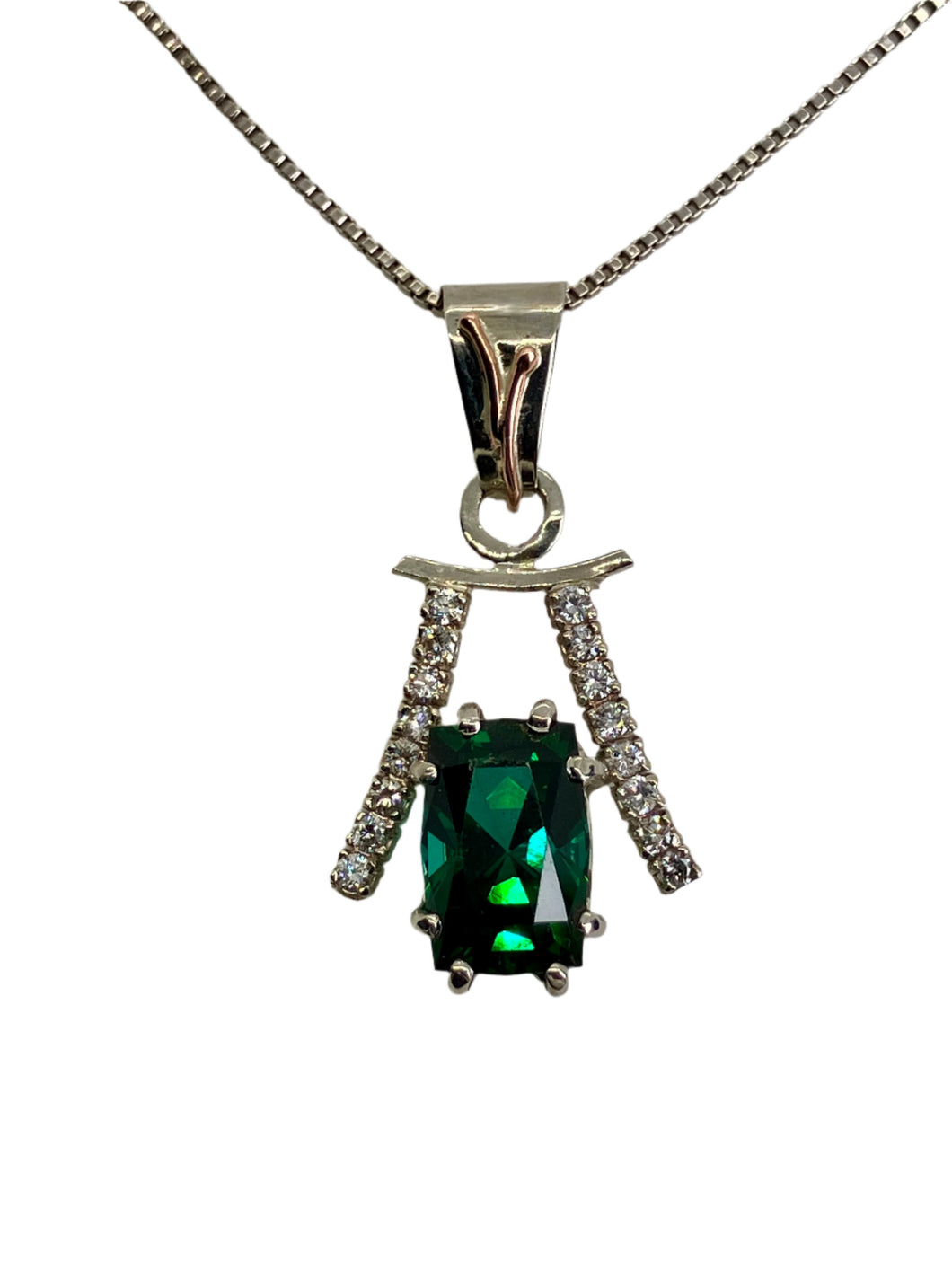 sparking green tourmaline and diamond pendant