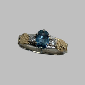 USA mined teal sapphire in mixed 14K gold, handmade ring