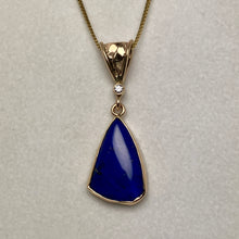 Load image into Gallery viewer, blue lapis pendant, small diamond and a handmade leaf on the bale, 14K gold box chain
