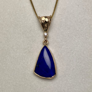blue lapis pendant, small diamond and a handmade leaf on the bale, 14K gold box chain