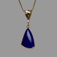 blue lapis pendant, small diamond and a handmade leaf on the bale, 14K gold box chain