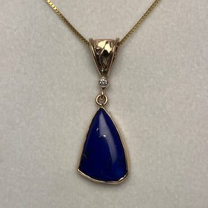 blue lapis pendant, small diamond and a handmade leaf on the bale, 14K gold box chain

