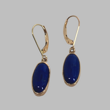 Load image into Gallery viewer, extra-fine quality, oval  deep blue Lapis Lazuli  in 14K yellow gold bezels on eurowire earrings
