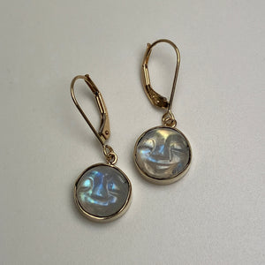 Gold earrings with round, faceted moonstones on euro wires