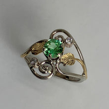 Load image into Gallery viewer, white gold ring with a  round lime green gemstone and 18K yellow gold leaf design
