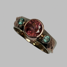 Load image into Gallery viewer, White gold ring with a large pink Zircon and two smaller green Parieba Tourmalines, leaves and vines in rose gold

