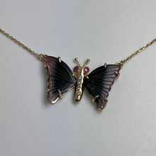 Load image into Gallery viewer, butterfly shaped necklace with dark green tourmaline wings with pink tips, pink sapphire eyes  and upcycled diamond body in 14K gold
