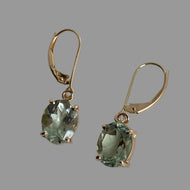 faceted green gemstones in 14K gold simple prong settings, dangles