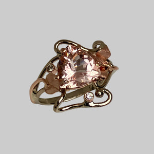 Rose and white gold ring with a triangle pink Morganite oand a garden motif