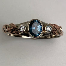 Load image into Gallery viewer, Teal blue oval Montana Sapphire and 2 upcycled Diamonds with 14K rose gold leaves and vines

