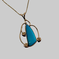 Gold necklace with Sleeping Beauty  turquoise pendant  with 3 leave and vines