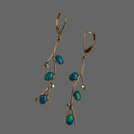 14k Gold earrings with 3 oval natural oplals and 2 diamomds each