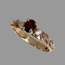 Load image into Gallery viewer, Gold ring with an oval red Garnet and smaller diamonds, leaves ane vines

