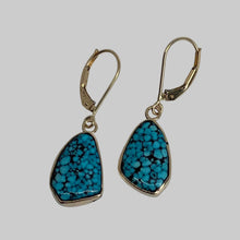 Load image into Gallery viewer, Freeform Turquoise earrings with black spiderweb in 14K gold bezels on Eurowires.
