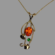  orange Opal and green Garnet pendant with leaves, vines and swirls