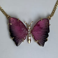Pink and green  tourmaline wings, Butterfly-shaped pendant, body is made with 5 diamonds and 14 yellow gold.