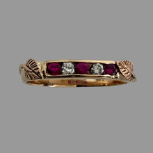 Load image into Gallery viewer, Rose gold ring  channel set with rubies and diamonds and adorned with a handmade leaf on each side
