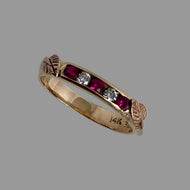 14K rose gold ring with 3 rubies and 2 diamonds, with a pair of handmade leaves and vines