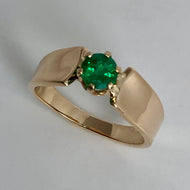 Thick 14K gold ring with a bright  round emerald in a 6 prong setting