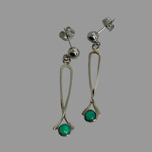 Load image into Gallery viewer, A pair of  14K white gold post and ball dangle earrings each with a round bezel set opal at the bottom.
