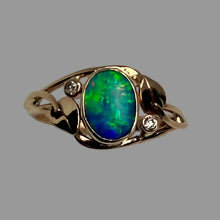 Load image into Gallery viewer, Extra fine blue/green Australian opal cabochon in a bezel setting with  2 natural diamonds in an openwork 14K yellow gold ring featuring 2 leaves and vines.
