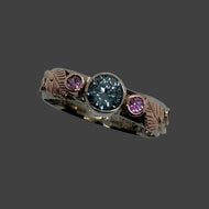 gorgeous bluey Montana Sapphire with 2 pink sapphires, rose and white gold band
