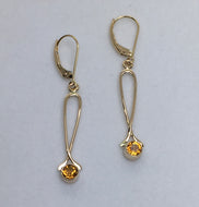 sparkling round bezel set amber colored citrines in 14K gold dangling exclamation point earrings