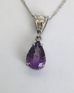 unique bubble cut Amethyst hanging from fancy bail in white 14KG