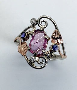 Carved Natural Pink Sapphire Ring with Diamonds and Tanzanites